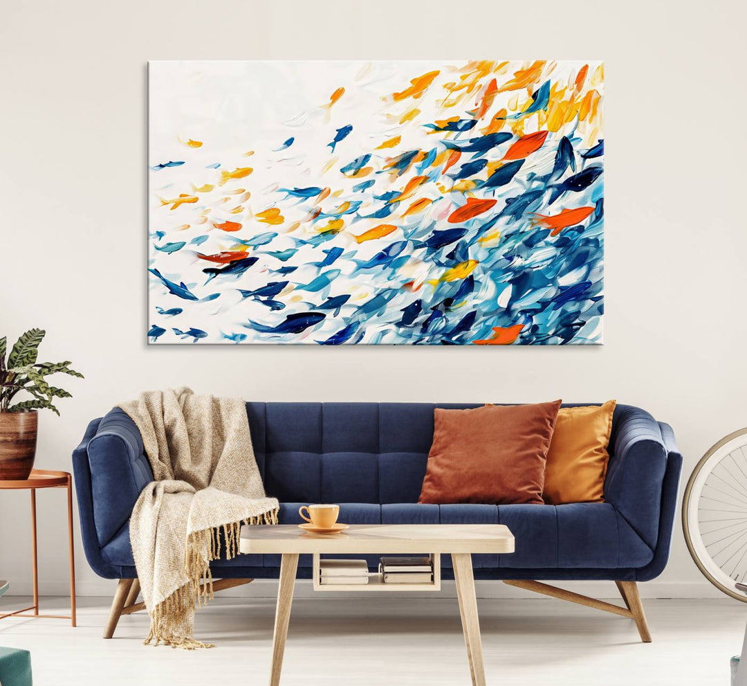 A colorful Abstract Fish Shoal Canvas Print hangs on the wall.