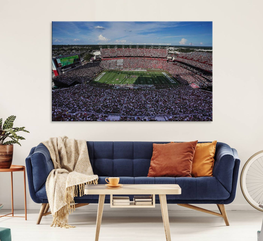 The wall art is a South Carolina Gamecocks print, showcasing Williams-Brice Stadium from a distance under clear skies.