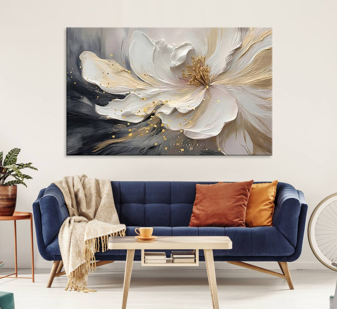 The abstract floral wall art canvas print features a large flower with gold accents.