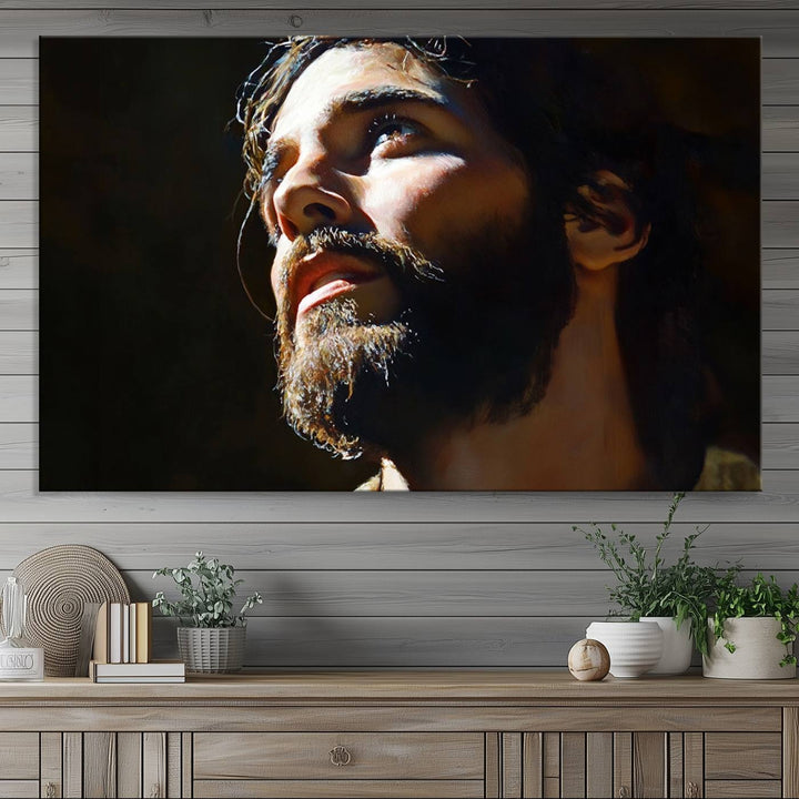 The Jesus Portrait Wall Art Canvas Print features a thoughtful depiction of Jesus Christ in an oil painting style, adding an inspirational religious touch to the decor.