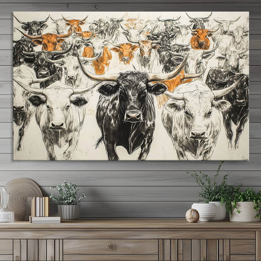 This exquisite farmhouse wall art, titled "Western Longhorn Cattle Canvas Print," showcases a majestic herd of longhorn cattle in a three-panel design. This ready-to-hang and framed barn decor infuses your space with rustic charm.