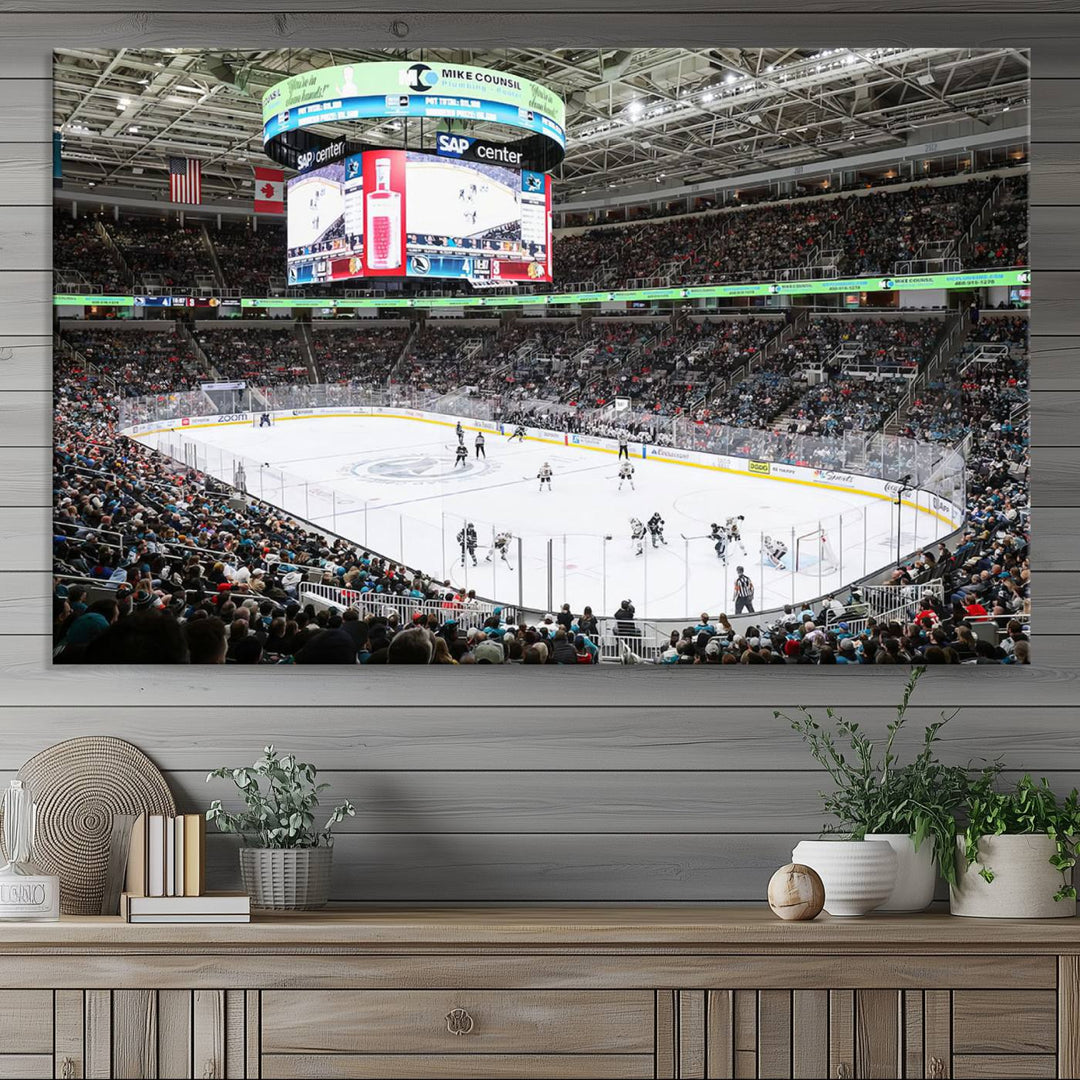 A packed ice hockey arena buzzes with energy as players glide on the ice and a large screen displays scores. The indoor decor features Sharks Arena Blackhawks Sharks Ice Hockey Stadium Wall Art Canvas Prints, creating an unexpected yet charming sporting atmosphere reminiscent of a gallery.