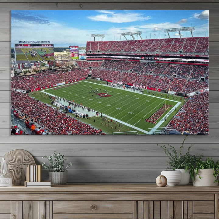 The Florida Tampa Raymond James Stadium Wall Art Canvas Print is featured above the cabinet.