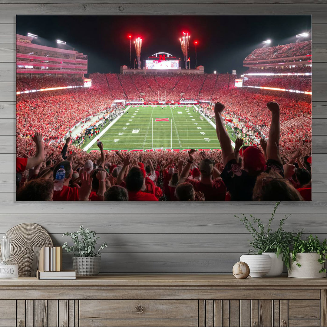 The University of Nebraska Cornhuskers Football Team Print, a vibrant three-panel canvas depicting Lincoln Memorial Stadium filled with enthusiastic fans from the end zone perspective, features a gallery-quality finish.