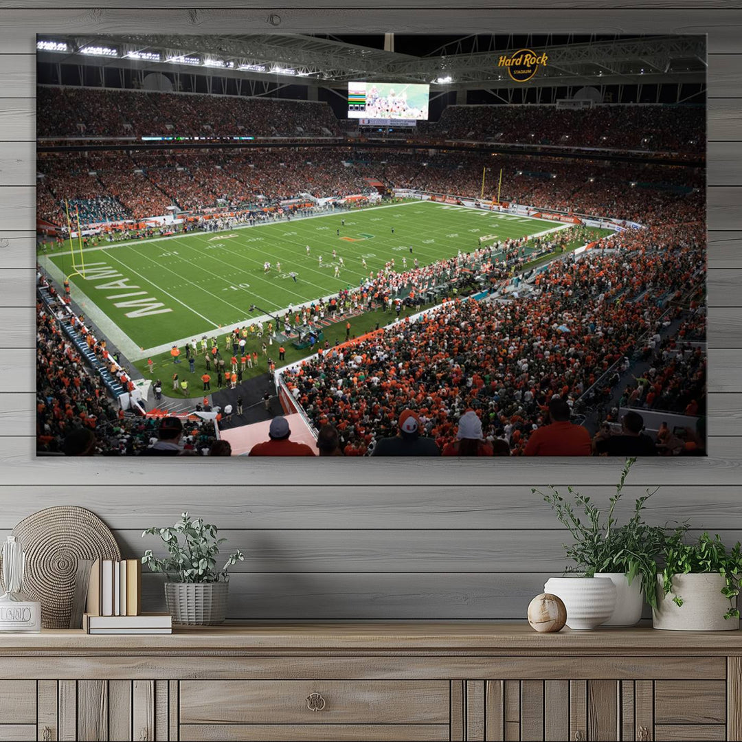 Aerial view of a Miami Hurricanes game at Hard Rock Stadium captured on canvas print, showcasing the teams on the field and fans in the stands.