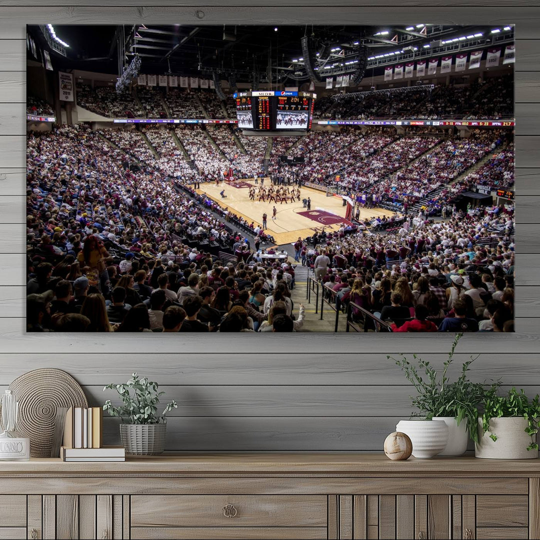 The Nebraska Basketball Arena Wall Art Canvas features an arena filled with Cornhuskers fans and players beneath a scoreboard.