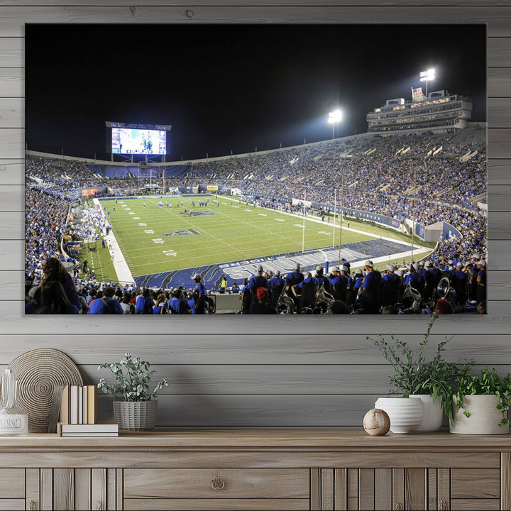 A vibrant depiction of Liberty Stadium at night, highlighting a Tigers football game on the large screen with stands filled with enthusiastic fans.