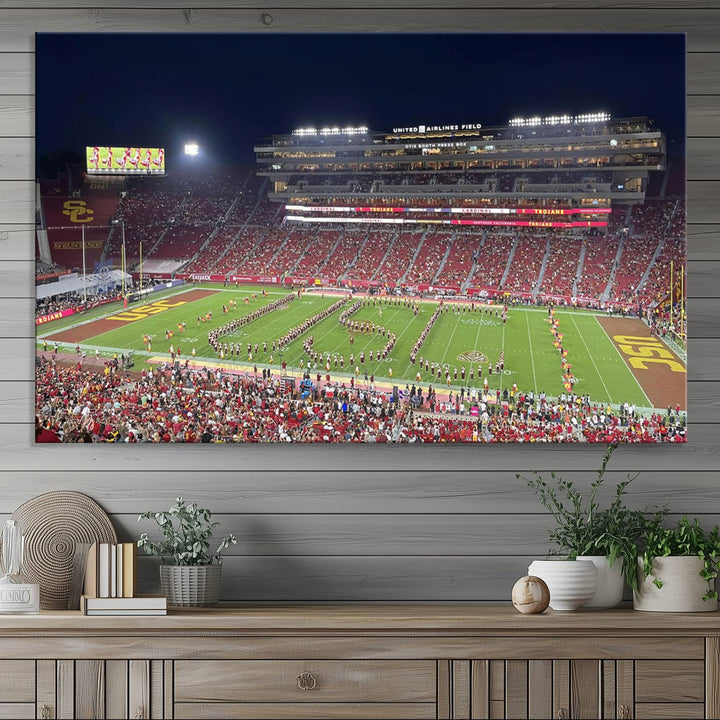 Canvas print depicting a packed stadium at night with a marching band forming USC, celebrating the Trojans at Los Angeles Memorial Coliseum.