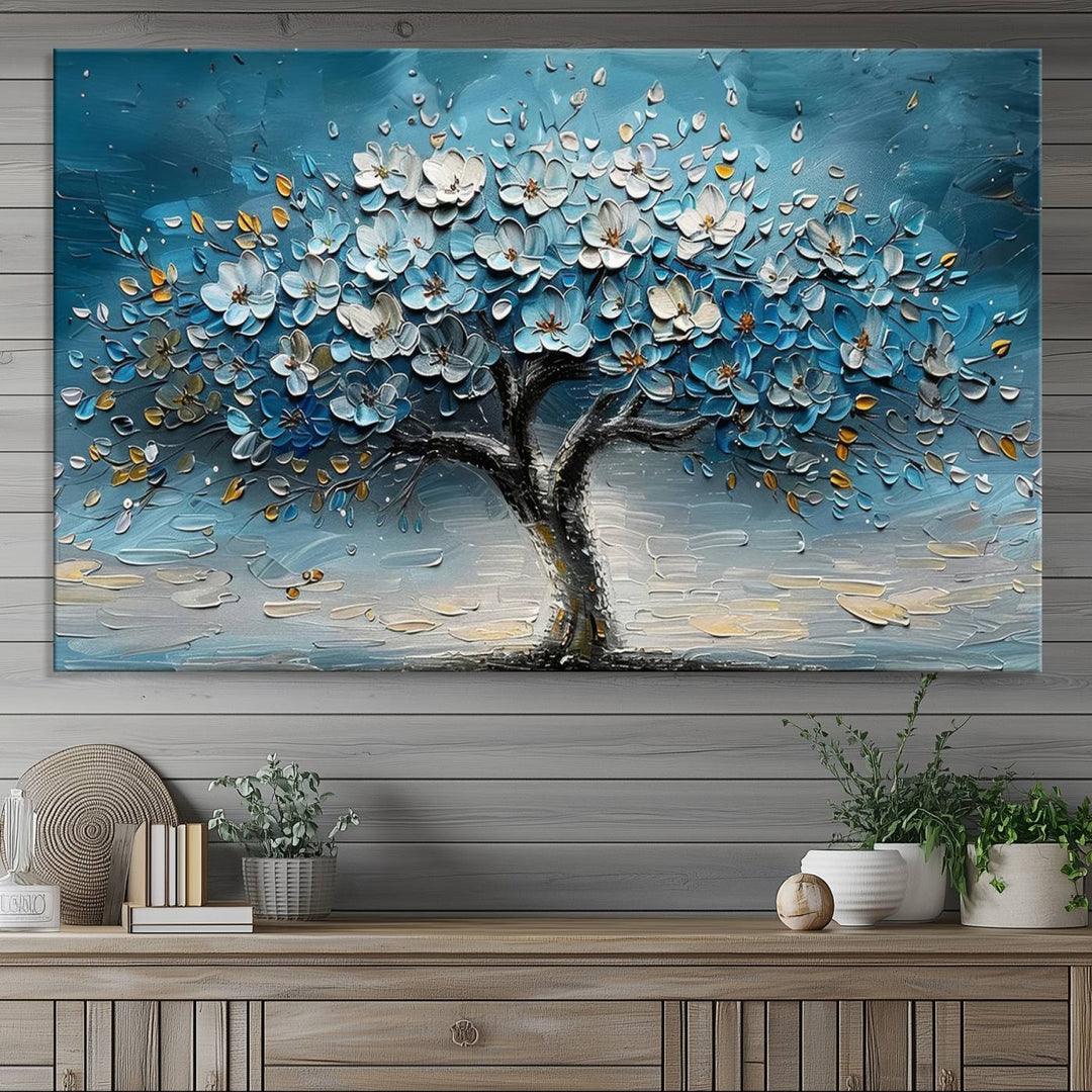 Abstract Blooming Tree Wall Art Print features blue, white, and gold textures on museum-quality canvas, perfect for modern decor.