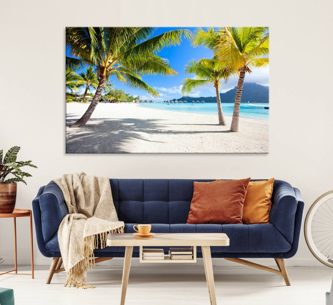 Blue Beach and Sea Wall Art Canvas Print: showcases a tropical scene with palm trees, white sand, and turquoise water.