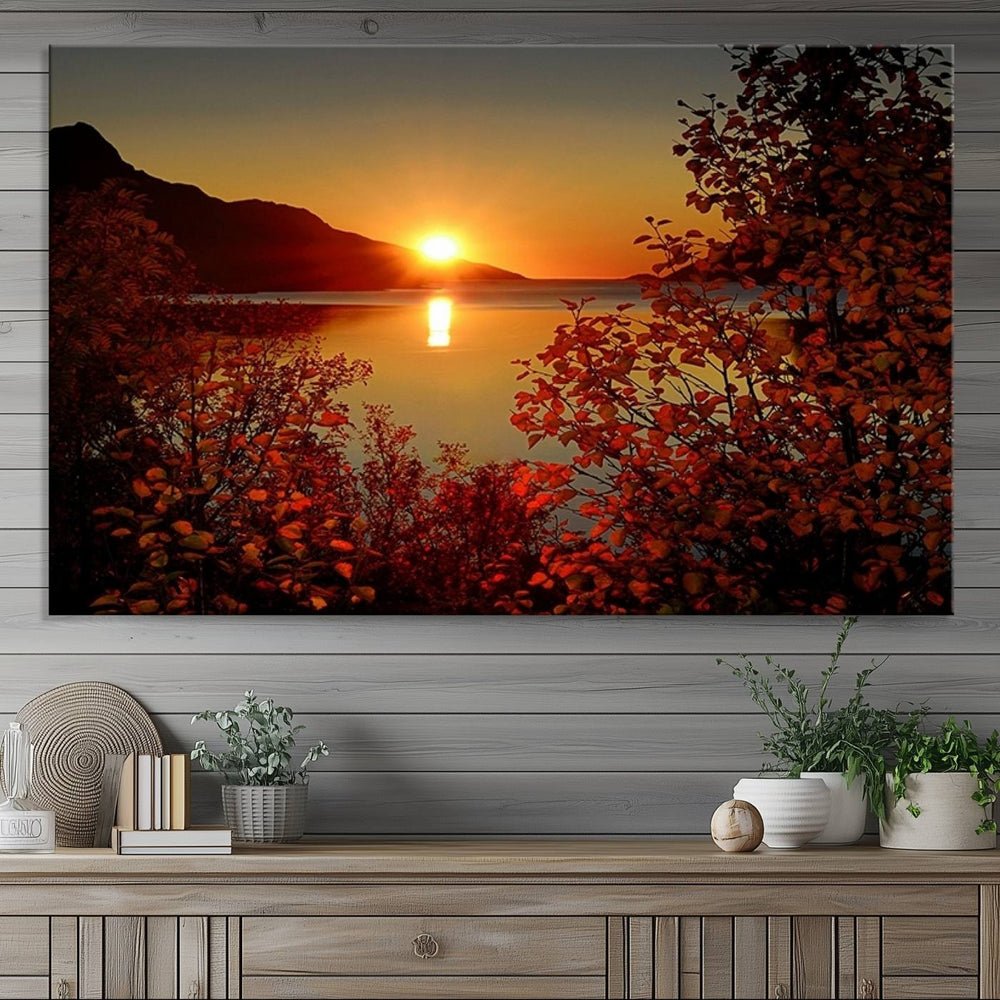 The Autumn Sunset Over Lake 3-Panel Giclee Canvas Art adorns the wooden wall.