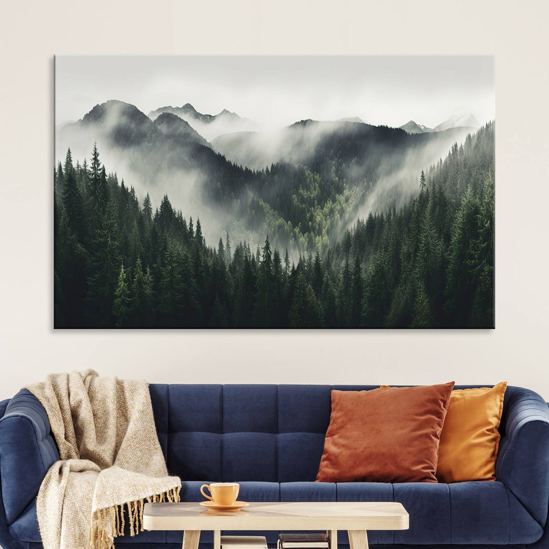 The Misty Forest Canvas Print Wall Art captures a serene misty forest scene with fog and mountains.