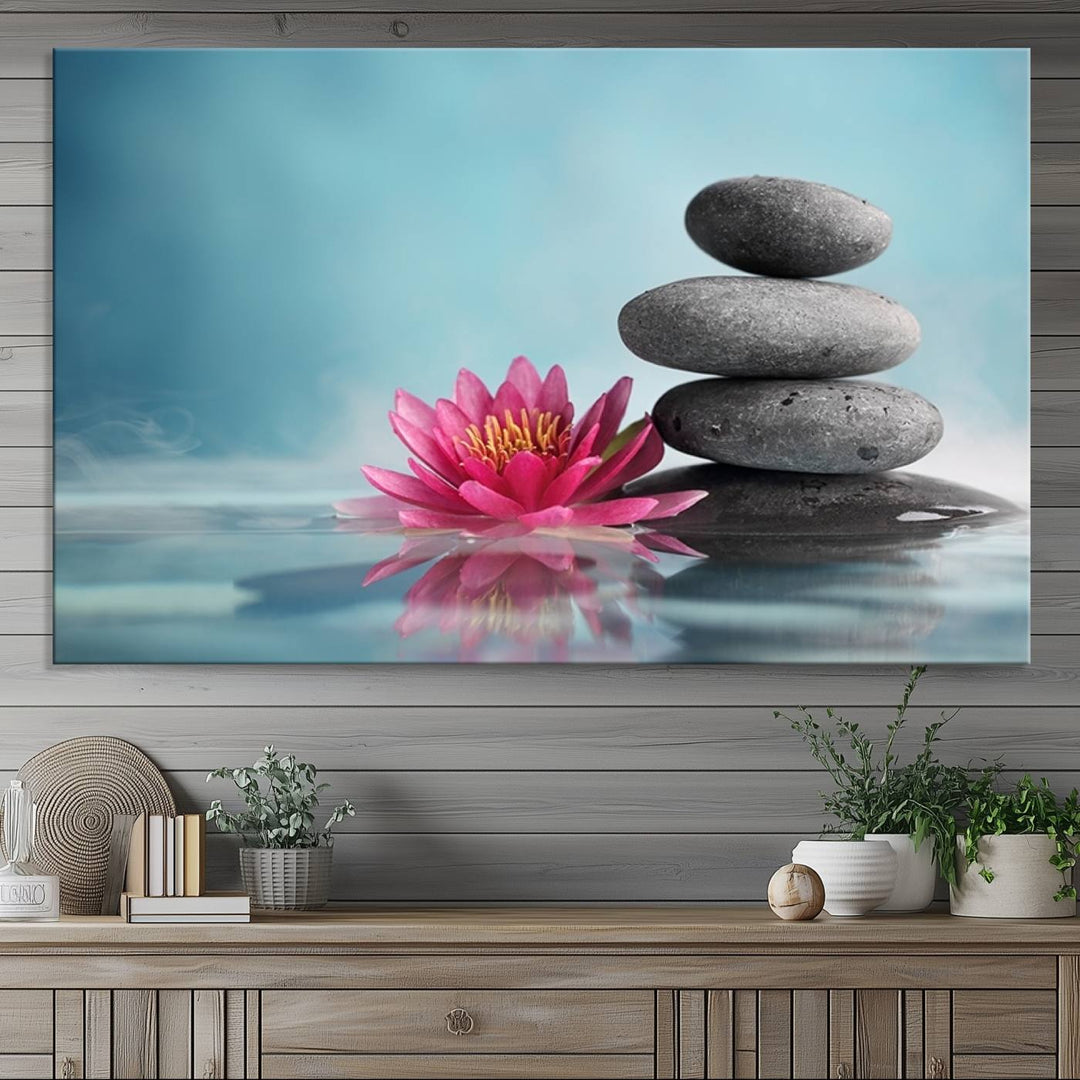 The dining room features a Zen Serenity Triptych wall art, showcasing a calming depiction of lotus flowers and balancing stones.