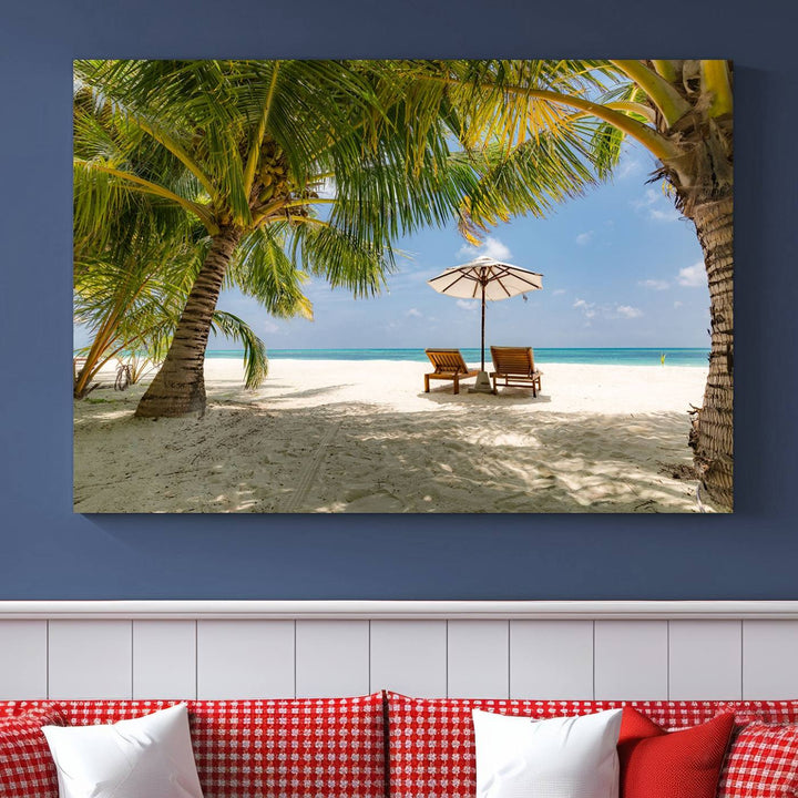 The canvas art print titled Lounge Chairs Palm Trees on Tropical Beach offers free shipping.