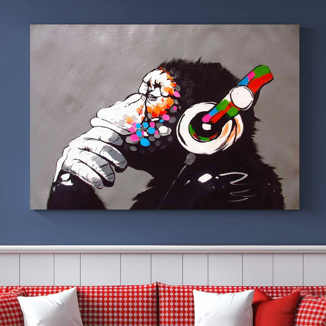 A vibrant triptych, the "DJ Monkey Listening to Music" wall art print, features a Banksy-inspired large canvas adorned with colorful modern pop art. This striking piece elegantly enhances the room with its dynamic and lively depiction.