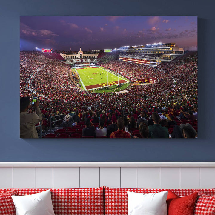 The vibrant wall art canvas print captures the USC Trojans playing under lights at dusk in LA Memorial Coliseum.