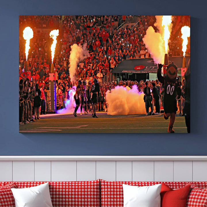 This canvas print captures the UTSA Roadrunners storming the Alamodome under smoke and fire.