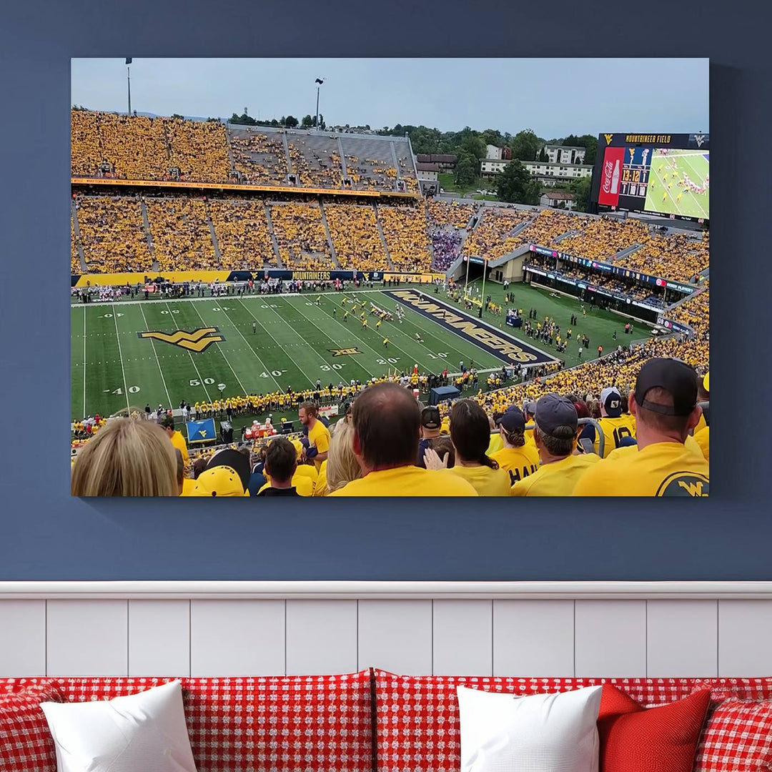 A Puskar Stadium canvas print decorates the modern living room shelf.