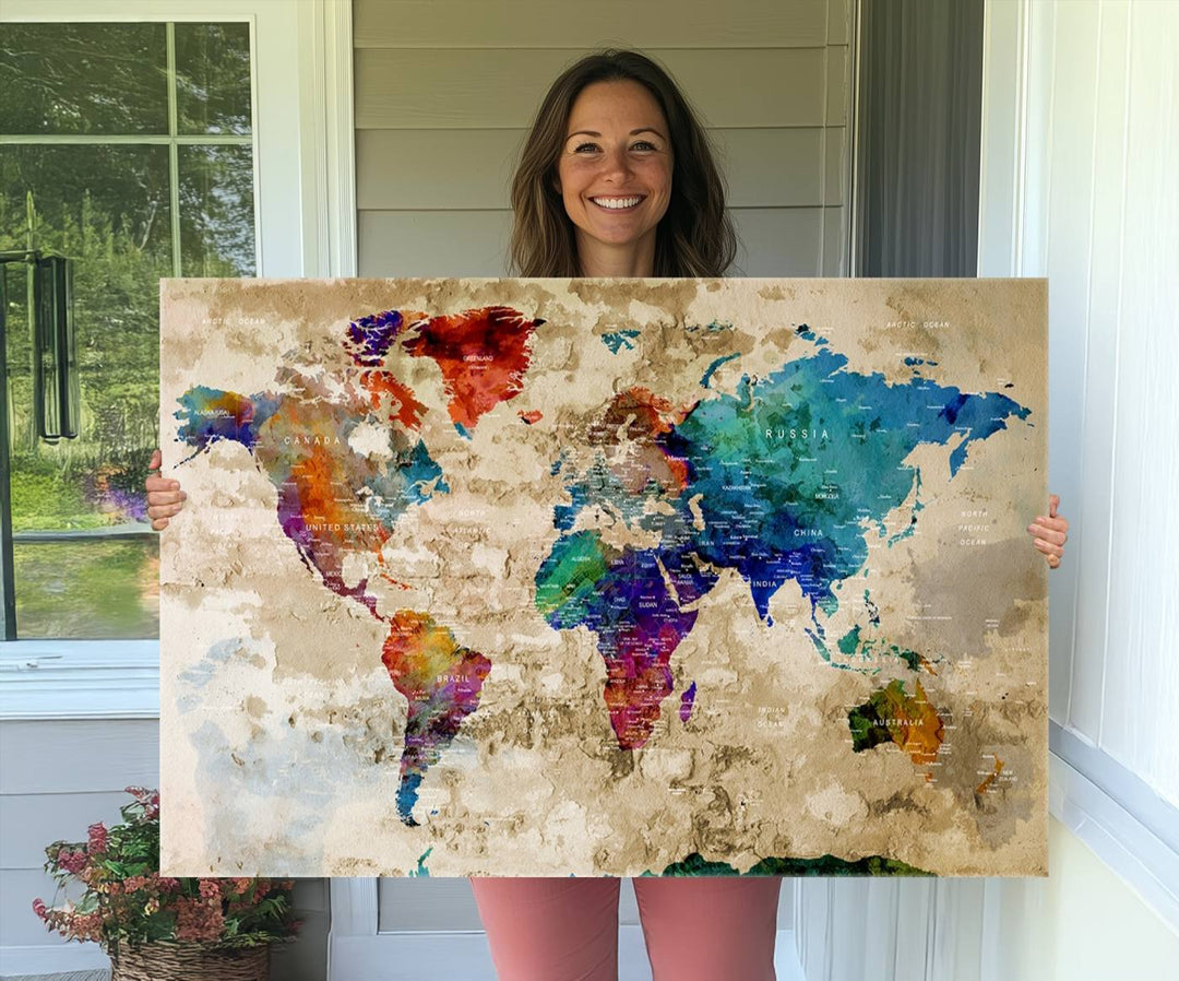 An Abstract Large Watercolor World Map Canvas Print hangs prominently.