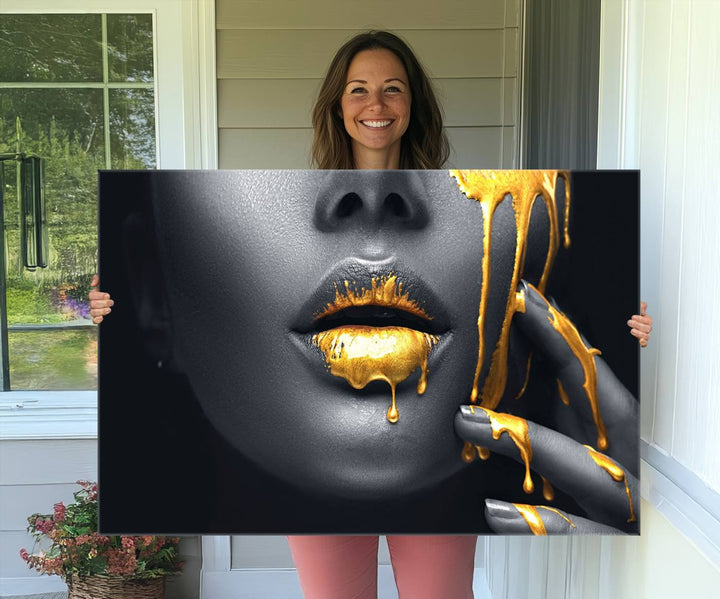 The Gold Lips and Black Woman Makeup Canvas Print features a chic monochrome face design, making it ideal for a modern dining room.