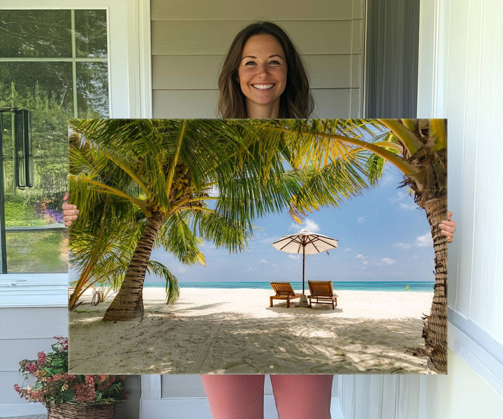 The canvas art print titled Lounge Chairs Palm Trees on Tropical Beach offers free shipping.