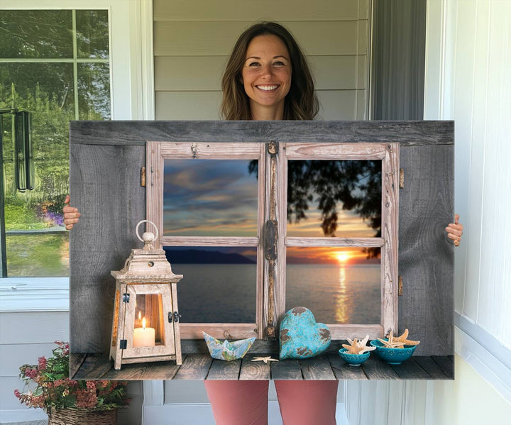 The Astonishing Sunset from the Window canvas print beautifully captures a sea view, accompanied by a lantern and starfish.