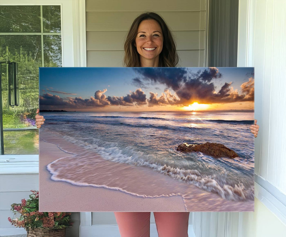 The room features a Sunset Beach Waves Canvas above the counter.