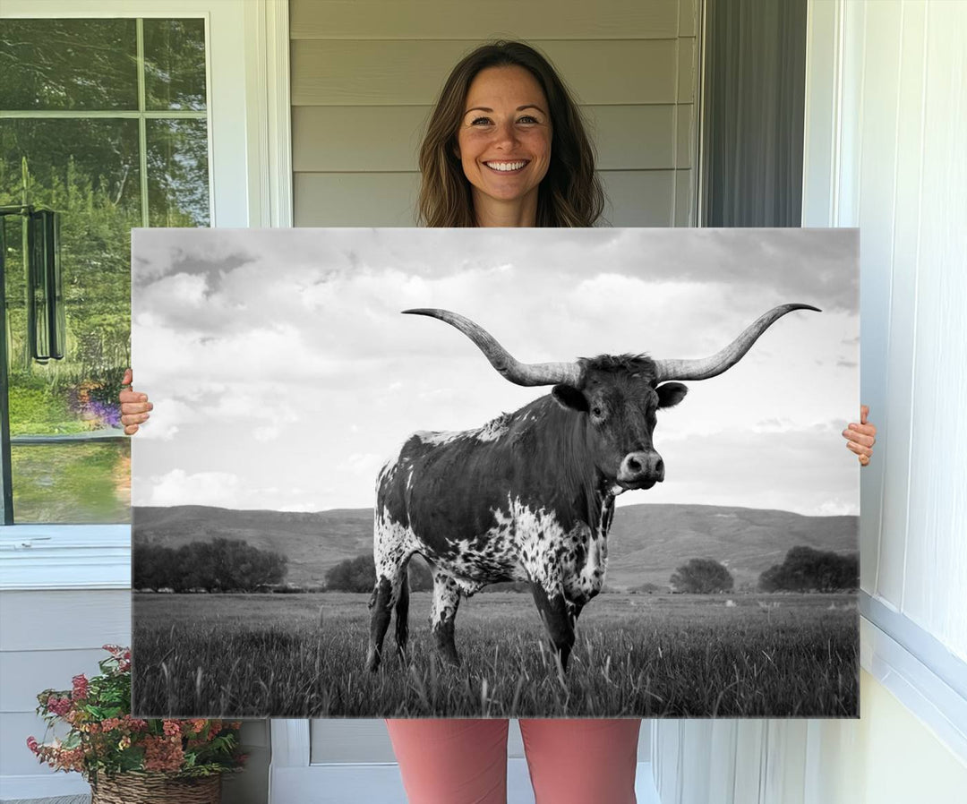 A Black and White Longhorn Texas Cow Canvas Wall Art.