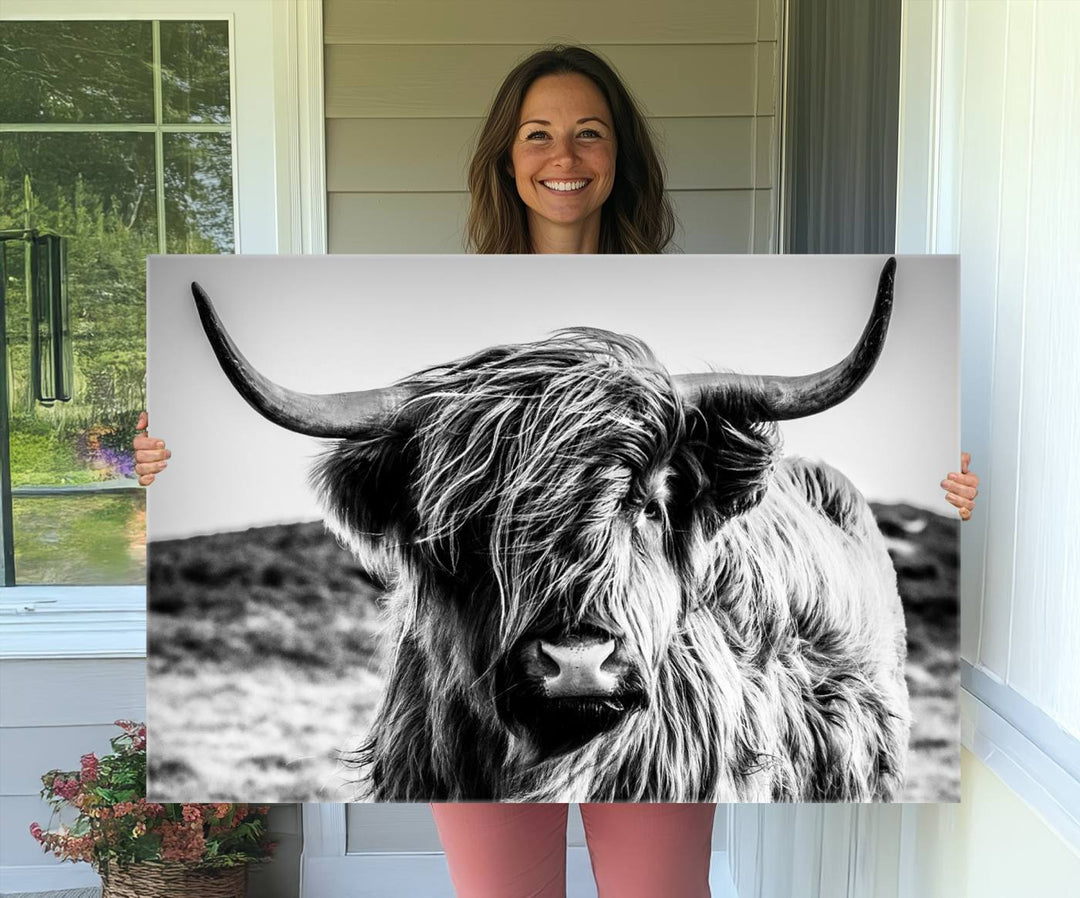 A Black and White Scottish Cow Canvas Print adorns the kitchen wall, perfect for farmhouse decor.