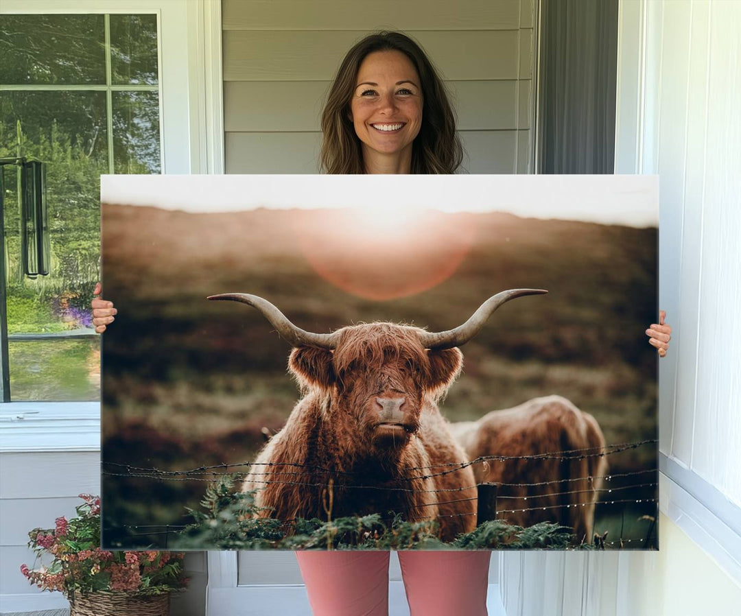 A Highland Cow Animal Canvas Wall Art, featuring a grassy field, is displayed on the wall.