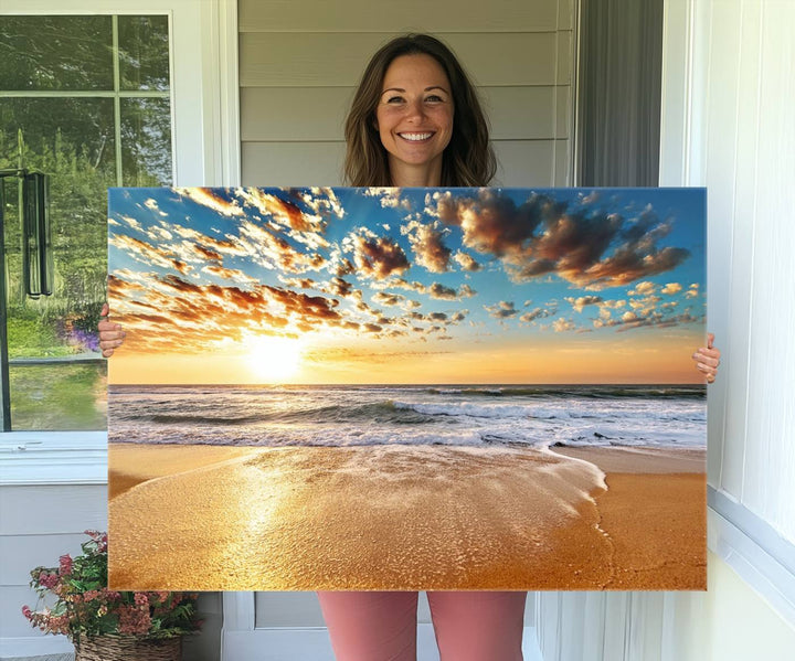 A Golden Sunset Beach giclee triptych canvas hangs prominently.