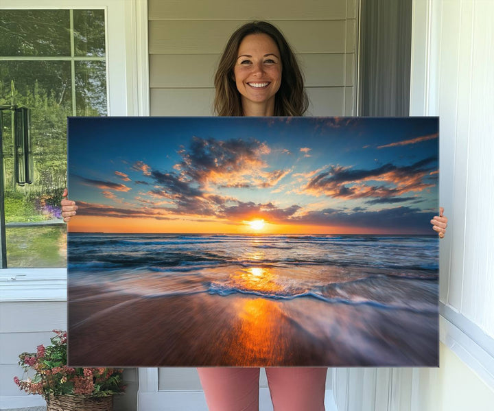 The Sunset on the Ocean canvas adds coastal ambiance to the wooden wall.