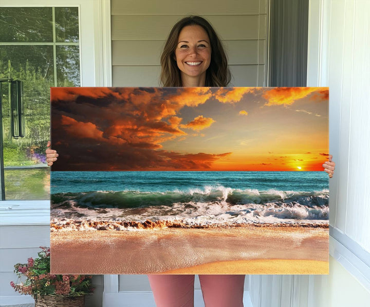 A Golden Sunset Beach triptych seascape canvas hangs on the wall.