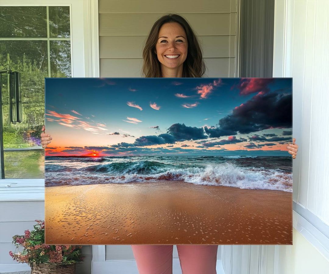 A large 3-panel sunset ocean beach canvas is displayed above the counter.