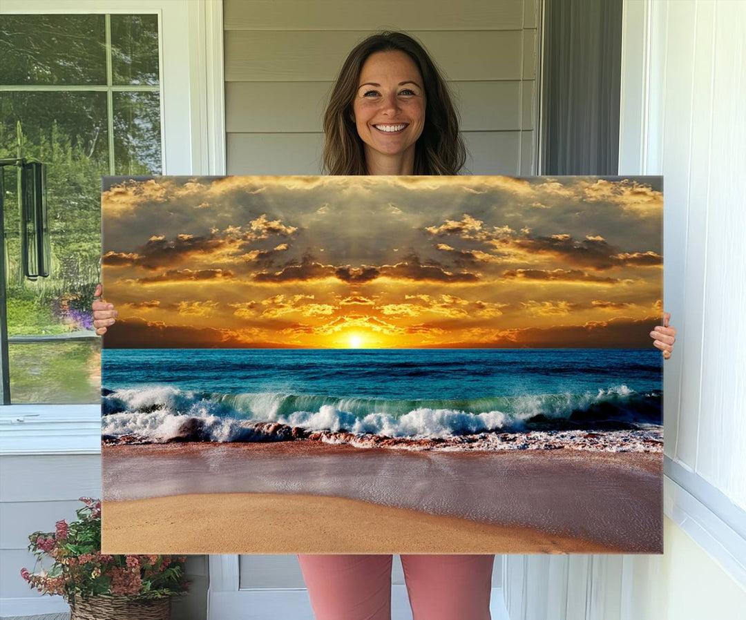 The Ocean Sunrise Over Golden Beach Waves wall art is prominently displayed, capturing the serene beauty of a beach at sunrise.