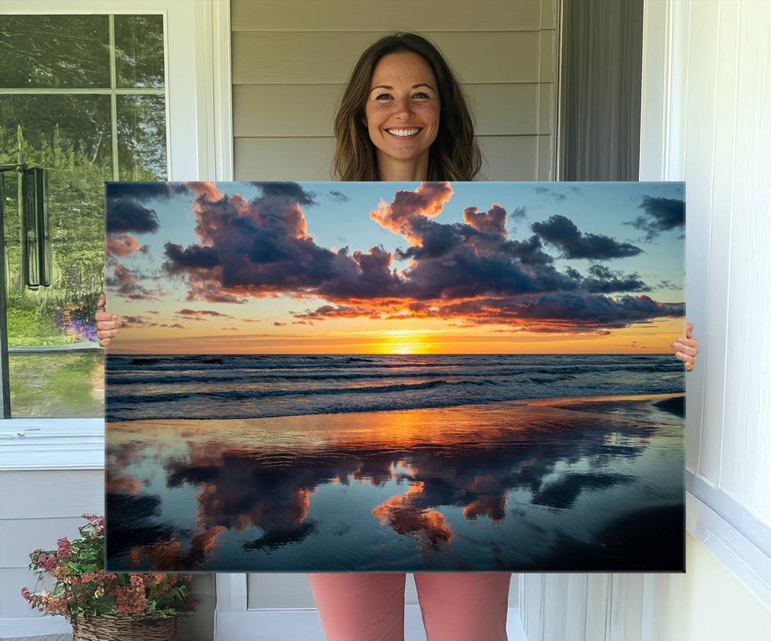 A Beach Sunset Print - Stunning Ocean Canvas Artwork adorns the wall.