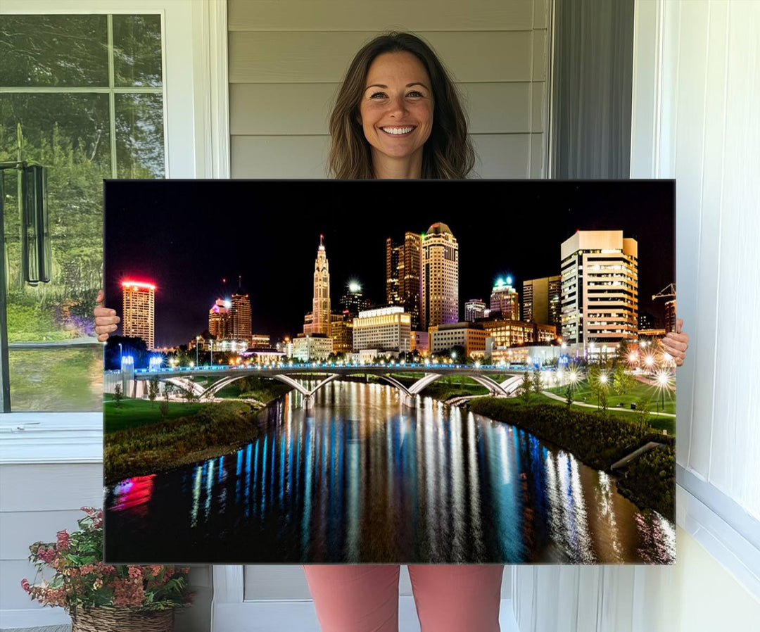 The Columbus City Lights Night Skyline Wall Art Canvas Print adorns the wall.