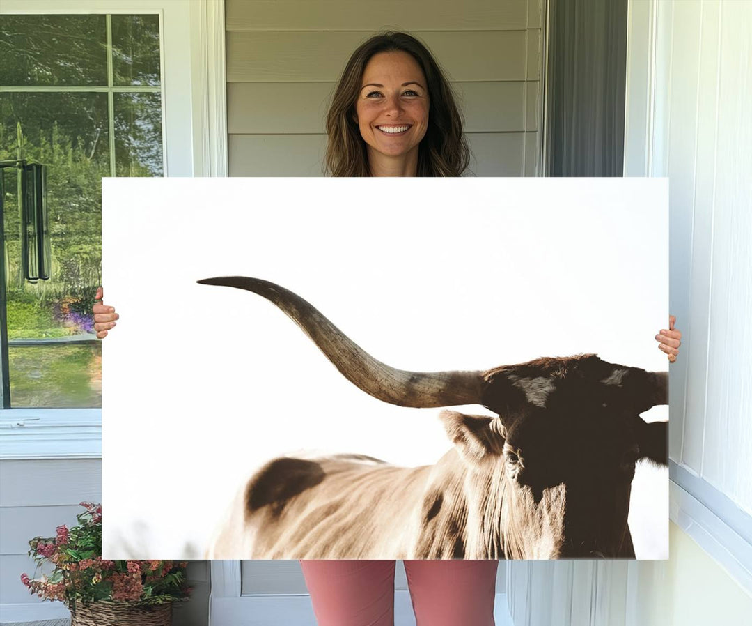 A 3-panel Texas Longhorn canvas adds a touch of rustic Western decor.