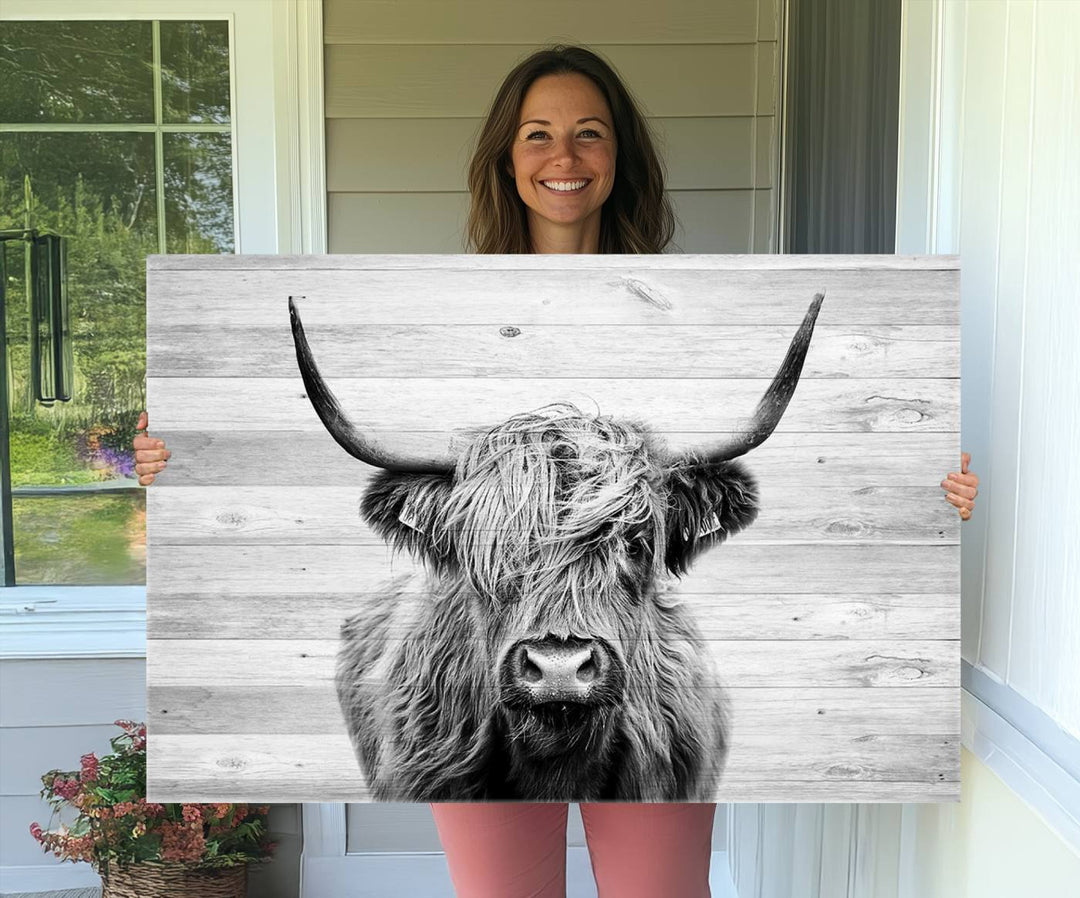 Scottish Highland Cow Cattle Art adds rustic farmhouse charm to the space.