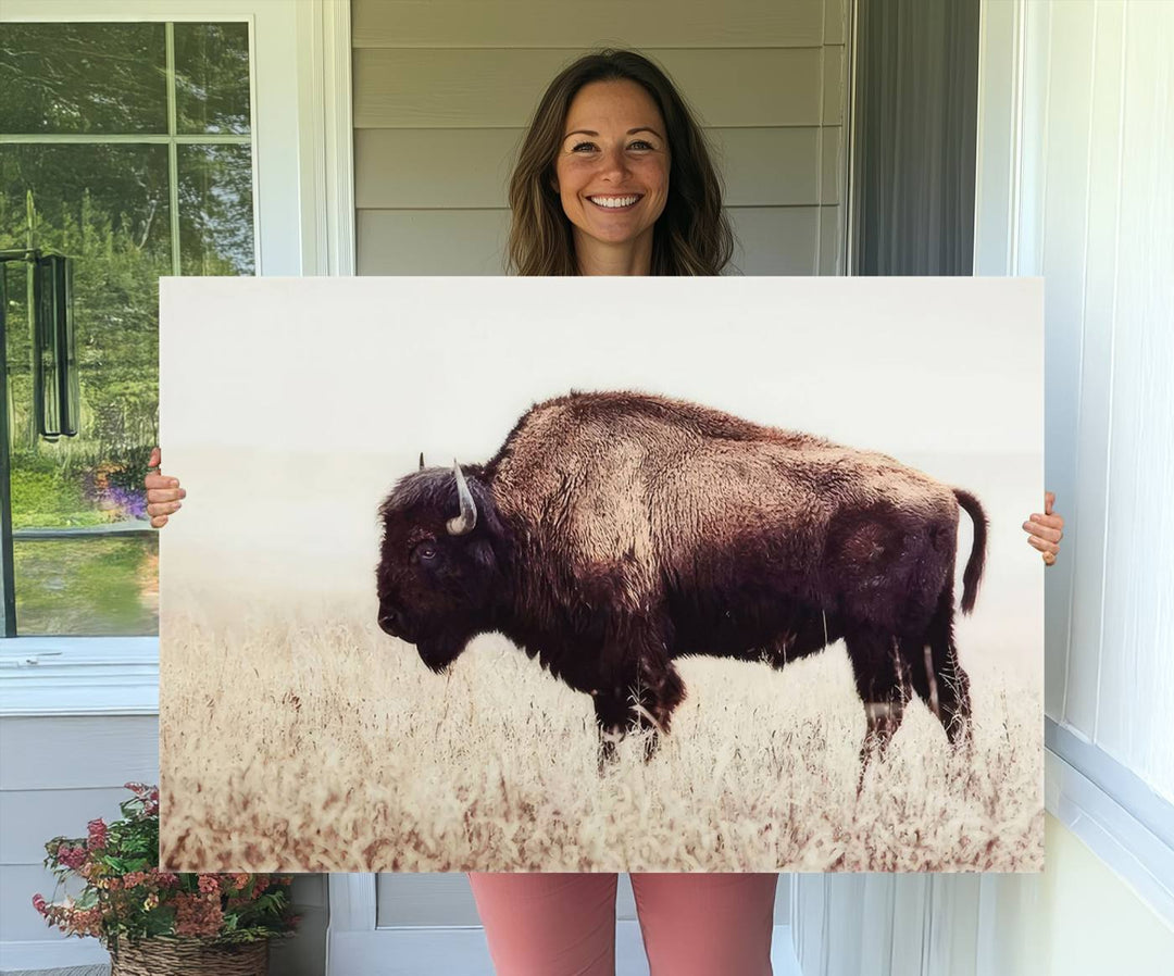 The dining room showcases the Bison in Field canvas print.