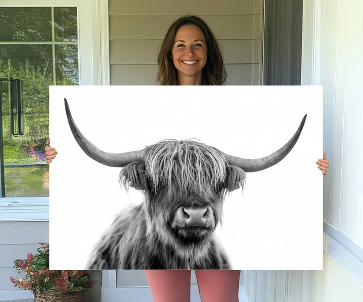 A Scottish Highland Cow Art Canvas adds charm to the farmhouse decor.