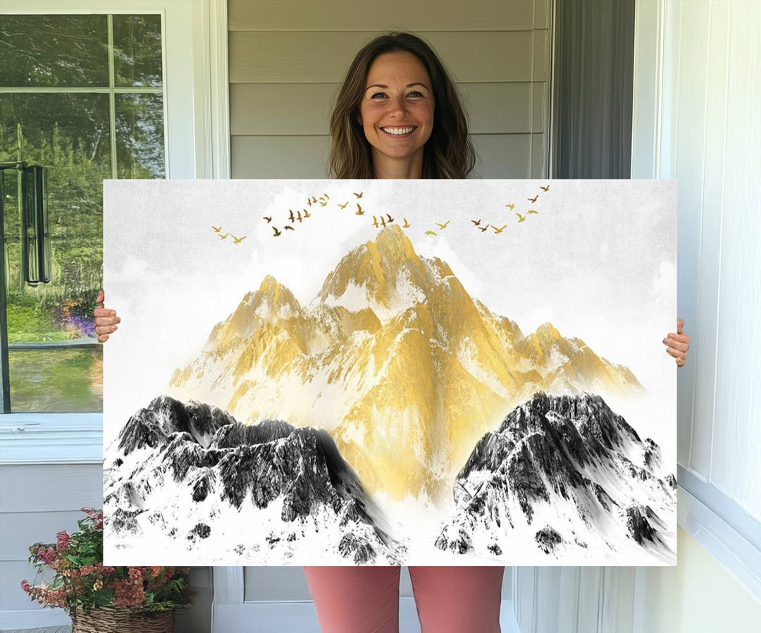 Golden Mountain Triptych Wall Art features gold-tinted mountains and birds.