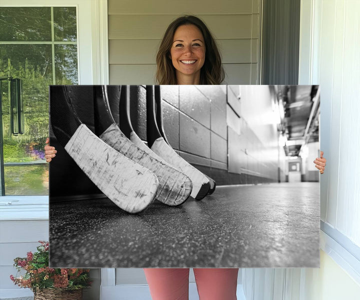 Ice Hockey Wall Art Canvas Print features a UV-protected black and white photo of hockey sticks.