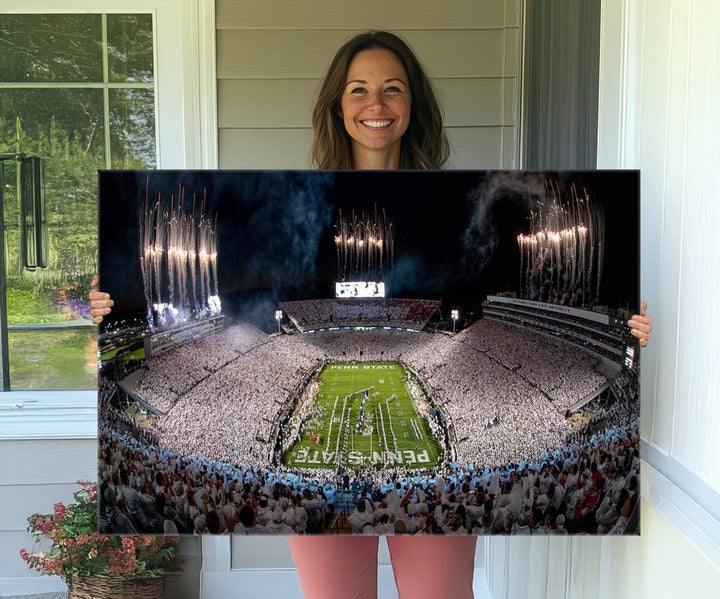 The perfect Penn State Football canvas wall art features a depiction of Beaver Stadium filled with fans in white, with fireworks exploding above.