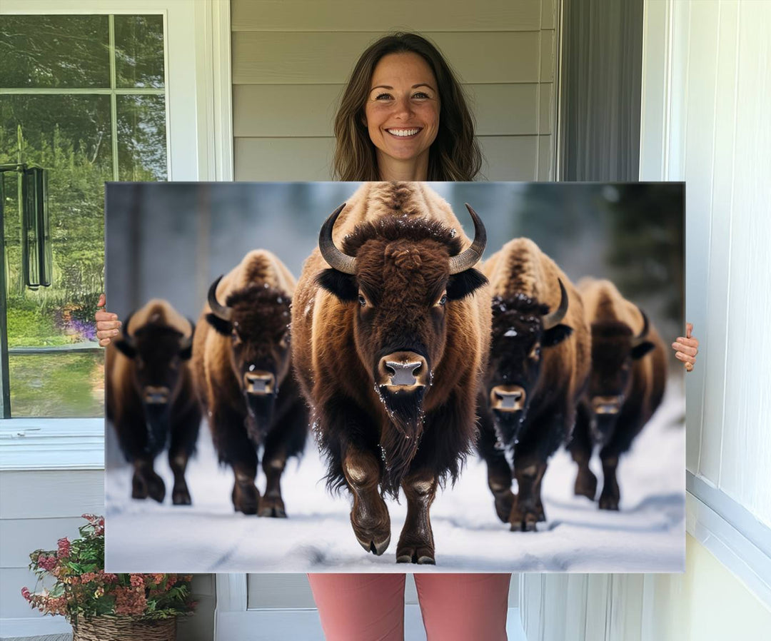 The dining room features an American Bison Herd Canvas Print against the snow.