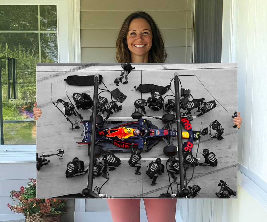 Red Bull Formula 1 Canvas Wall Art Print: An aerial view of a Formula 1 pit stop featuring a Red Bull car on premium canvas.