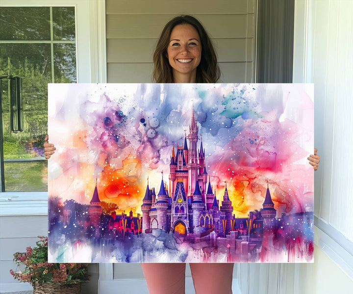 The watercolor Disney Wall Art showcases Cinderellas Castle in pink, purple, and orange hues.