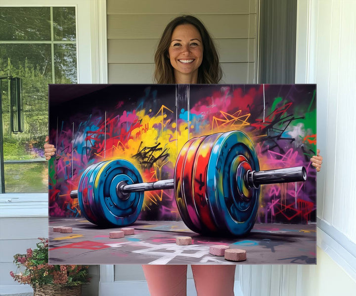 The Abstract Graffiti Barbell Canvas Wall Art is displayed on a porch.