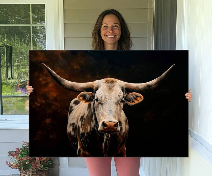 A large 3-panel Texas Longhorn canvas print dominates the space.