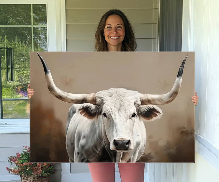 The kitchen features a striking canvas print of a Longhorn Bull.